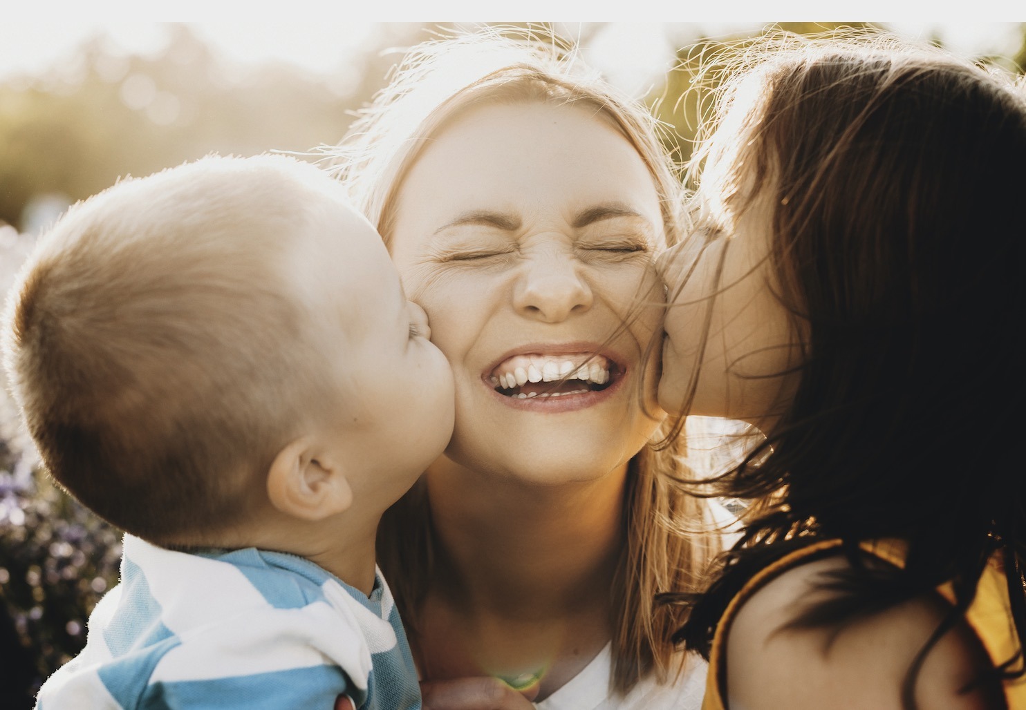 Woman with kids smiling