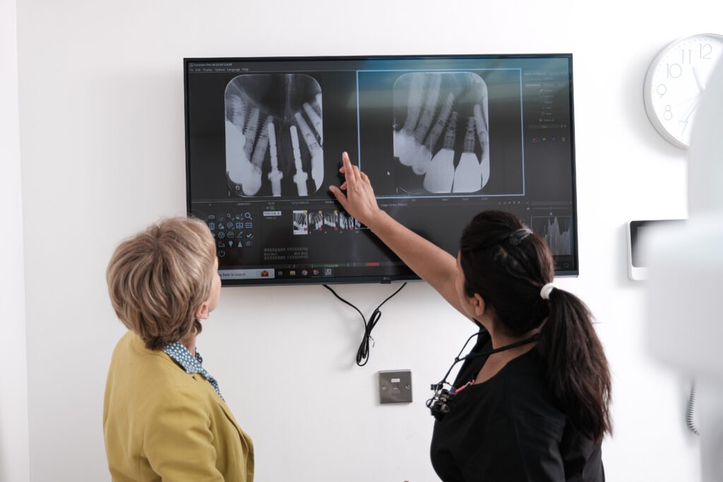 Woman getting same-day appointment at an emergency dentist in Ipswich.