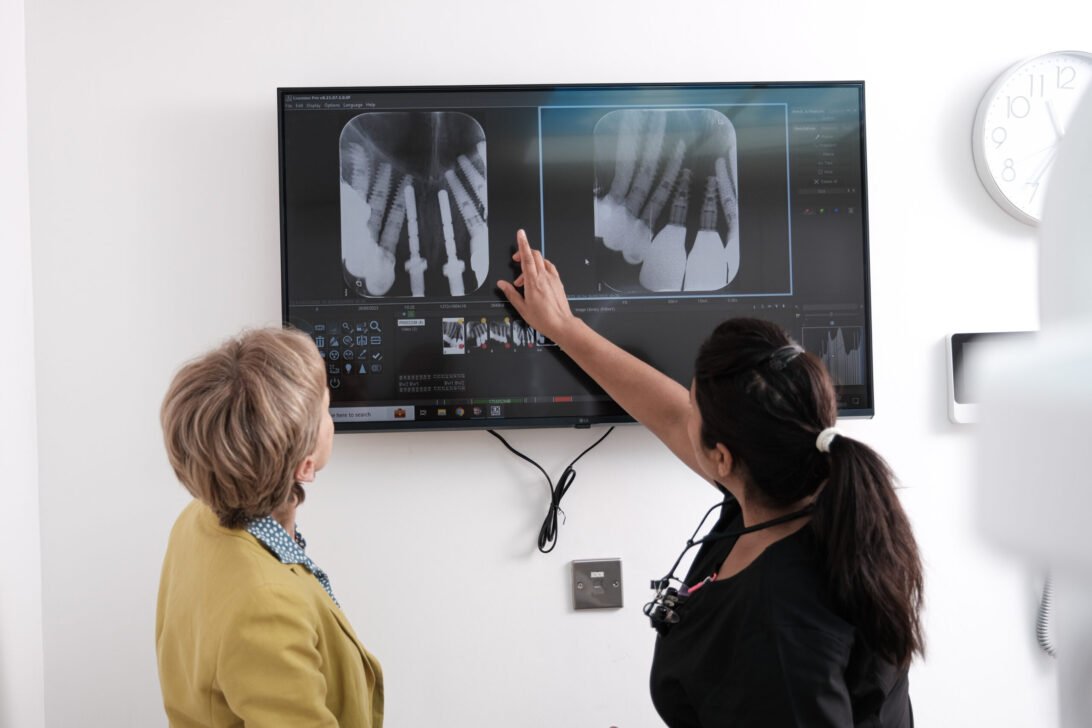 Woman getting same-day appointment at an emergency dentist in Ipswich.